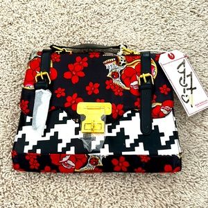 Foxtrot handbag with red, white and black design and skull with gold and belts